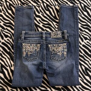 Miss me low rise embellished skinny jeans in size 24.